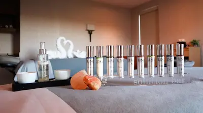 a group of wine bottles and cups on a table at Resorts World Catskills in Monticello