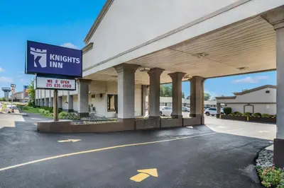 a building with a walmart sign in a parking lot at Knights Inn Trevose in Trevose