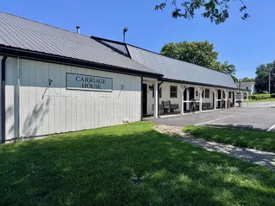 a building with a sign that reads garage house at Hershey Farm Resort in Ronks