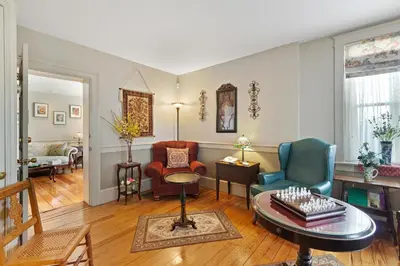 a living room with chairs and a table at After Eight Bed and Breakfast in Ronks