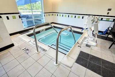 a swimming pool in a bathroom with a swimming poolvisor at Fairfield Inn & Suites by Marriott Harrisburg West/New Cumberland in New Cumberland