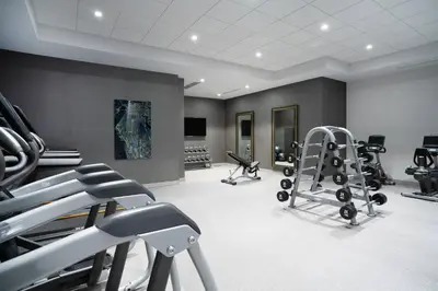 a gym with treadmills and exercise equipment in a room at Residence Inn by Marriott Weehawken in Weehawken