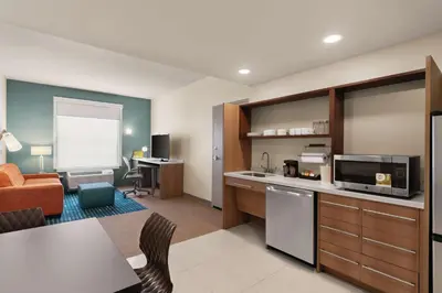 a room with a kitchen and a living room at Home2 Suites By Hilton Lancaster in Lancaster