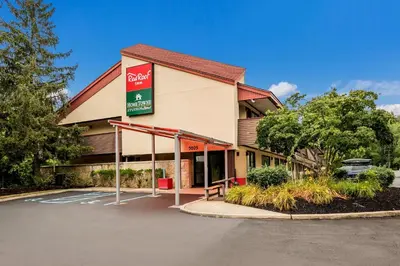 a fast food restaurant with a parking lot at Red Roof Inn Princeton - Ewing in Lawrenceville