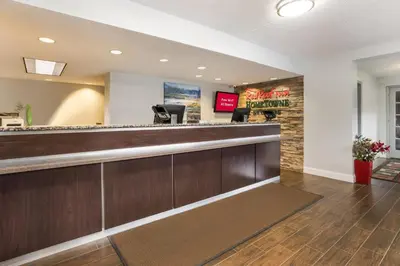 a bar in a hotel lobby with a counter at Red Roof Inn Princeton - Ewing in Lawrenceville