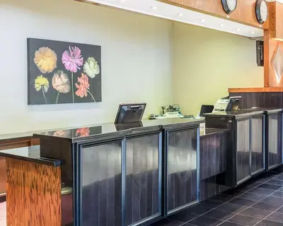a lobby with a reception desk at Clarion Hotel Somerset - New Brunswick in Somerset