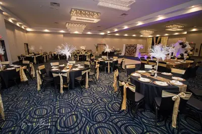 a banquet hall filled with tables and chairs at Holiday Inn Scranton East - Dunmore by IHG in Dunmore