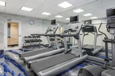 a gym with treadmills and elliptical machines at Fairfield Inn & Suites by Marriott Mahwah in Mahwah
