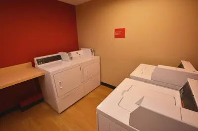 a laundry room with a washer and dryer at TownePlace Suites by Marriott Williamsport in Williamsport