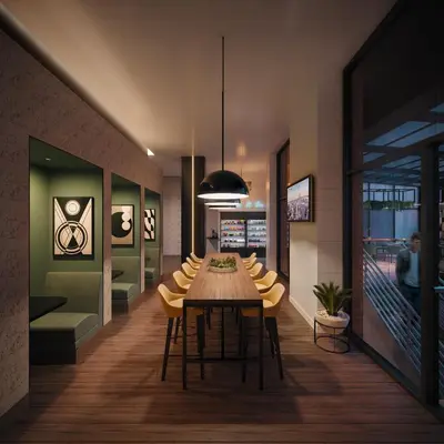 a dining room with a table and chairs at voco Times Square South New York by IHG in New York