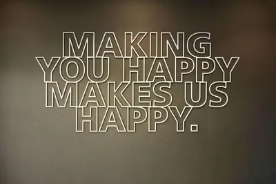 a sign that says making you happy makes us happy at Hampton Inn & Suites Philadelphia/Media in Media