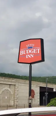a sign for a buffet inn in front of a building at Budget Inn Horseheads in Horseheads
