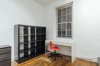 an office with a desk and a red chair at The Havana Lofts in Philadelphia
