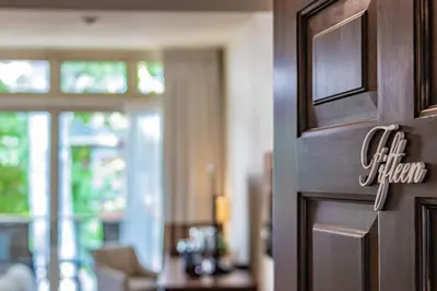 a door to a dining room with a sign on it at Carriage House New Hope in New Hope