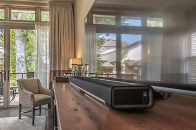 a living room with a pool table with a tv at Carriage House New Hope in New Hope