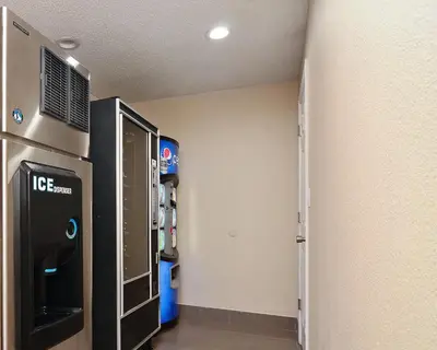 a room with a ice machine in a room at Red Roof Inn Binghamton North in Binghamton