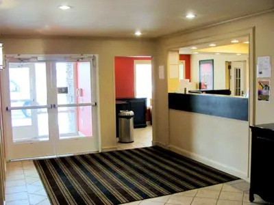 a lobby with an open door to a store at Extended Stay America Suites - Meadowlands - East Rutherford in East Rutherford