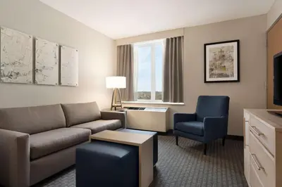 a living room with a couch and a chair at Homewood Suites University City Philadelphia in Philadelphia