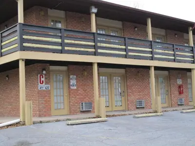 a brick building with a balcony on top of it at Motel 6-Shartlesville, PA in Shartlesville