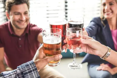 a group of people holding glasses of beer at Staybridge Suites East Stroudsburg - Poconos by IHG in East Stroudsburg