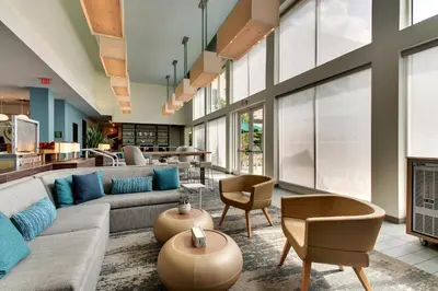 a living room with a couch and chairs at Element Ewing Princeton in Ewing