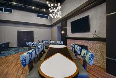 a conference room with a table and chairs at Homewood Suites - Doylestown in Warrington