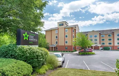 a building with a sign in front of a parking lot at Extended Stay America Suites - Princeton - South Brunswick in South Brunswick Terrace