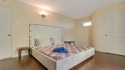 a bedroom with a bed with a blue bag on it at The Best Views From Camelback in Tannersville