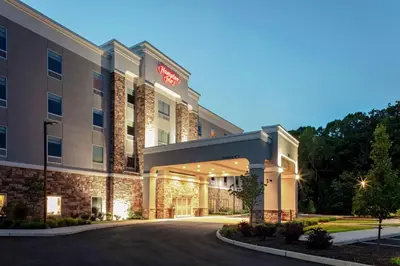 a rendering of the front of a hotel at Hampton Inn Cranbury in Cranbury