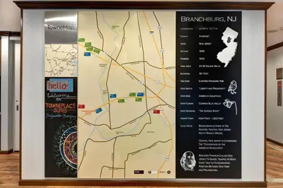 a sign with a map of the attractions at TownePlace Suites by Marriott Bridgewater Branchburg in Branchburg Park