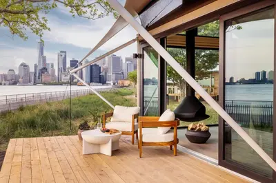 a house with a view of the city at Collective Retreats Governors Island in New York