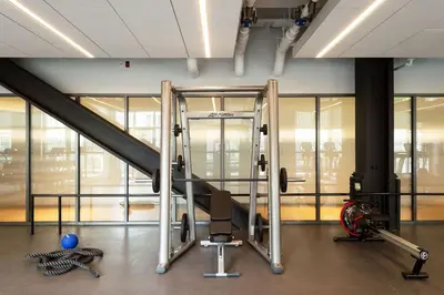 a gym with treadmills and a treadmill at ROOST East Market in Philadelphia