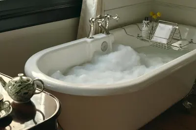 a bath tub filled with snow in a bathroom at The Ned NoMad in New York