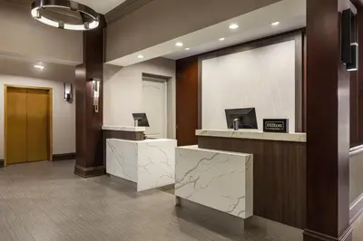 a lobby of a hotel with a reception desk at Homewood Suites by Hilton Philadelphia-City Avenue in Philadelphia
