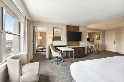 a hotel room with a bed and a desk at Homewood Suites by Hilton Philadelphia-City Avenue in Philadelphia
