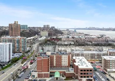 an aerial view of a city with buildings at Homewood Suites by Hilton Edgewater-NYC Area in Edgewater