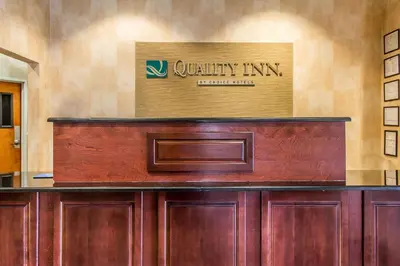 a wooden courtroom with a sign on the wall at Quality Inn Hackettstown - Long Valley in Hackettstown
