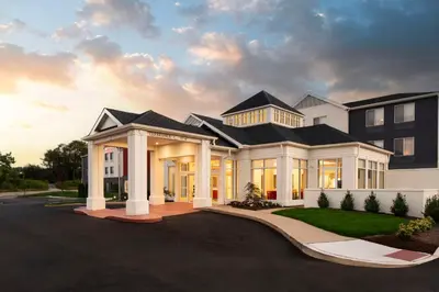 a rendering of a house with a driveway at Hilton Garden Inn Kennett Square in Kennett Square
