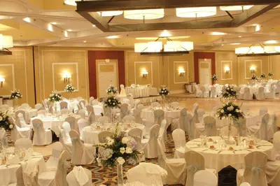 a large banquet hall with white tables and chairs at DoubleTree by Hilton Hotel & Executive Meeting Center Somerset in Somerset
