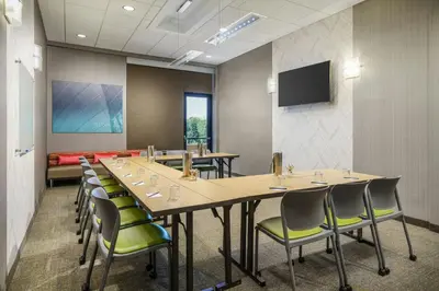 a conference room with a long table and chairs at SpringHill Suites by Marriott Philadelphia West Chester/Exton in Exton