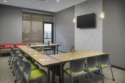 a conference room with a long table and chairs at SpringHill Suites by Marriott Philadelphia West Chester/Exton in Exton