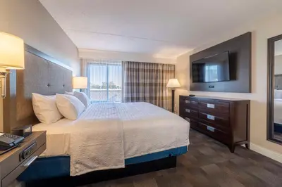 a hotel room with a bed and a television at Hampton Inn Carlstadt At The Meadowlands in Carlstadt