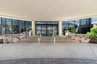 a building with stairs in front of it at Holiday Inn Express Princeton Southeast by IHG in Plainsboro
