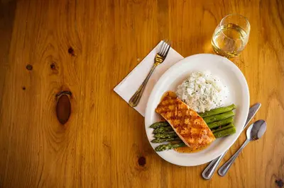 a plate of food with rice and vegetables on a table at AmishView Inn & Suites in Bird in Hand