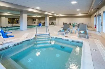 a pool in a hotel room with a swimming pool at AmishView Inn & Suites in Bird in Hand