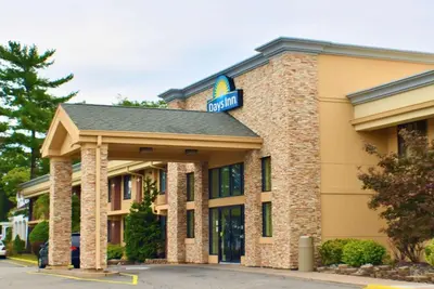 a hotel sign on the front of a building at Days Inn by Wyndham Wayne in Wayne