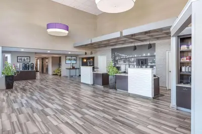 an empty lobby of a hospital with a pharmacy at La Quinta by Wyndham Clifton/Rutherford in Clifton