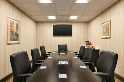 a conference room with a long table and chairs at Hampton Inn & Suites Hershey in Hershey