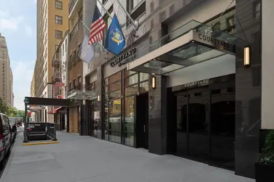 a store front of a building on a city street at Courtyard by Marriott New York World Trade Center Area in New York