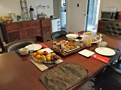 a table with two plates of food on it at Maurrocks - A Pocono Mountains B&B in Mount Pocono